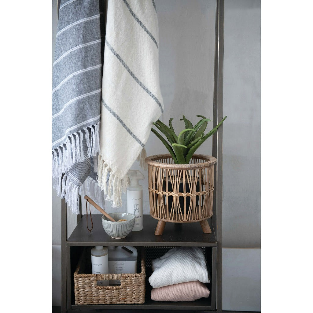 Bamboo footed baskets, boutique woven home décor storage.