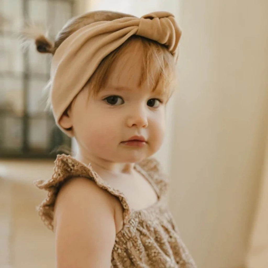 Knotted baby headband, boutique toddler accessory from Ella Collective Raleigh.